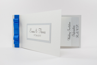 dark royal blue, silver and white butterfly cheque book wedding invitations