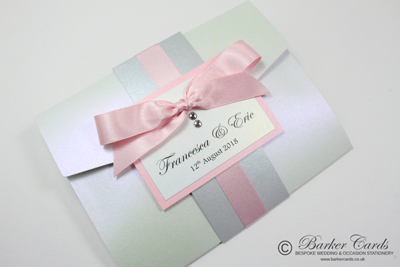Dreamy Pocketfold wedding invitations with card sleeve, bow and Swarovski crystals