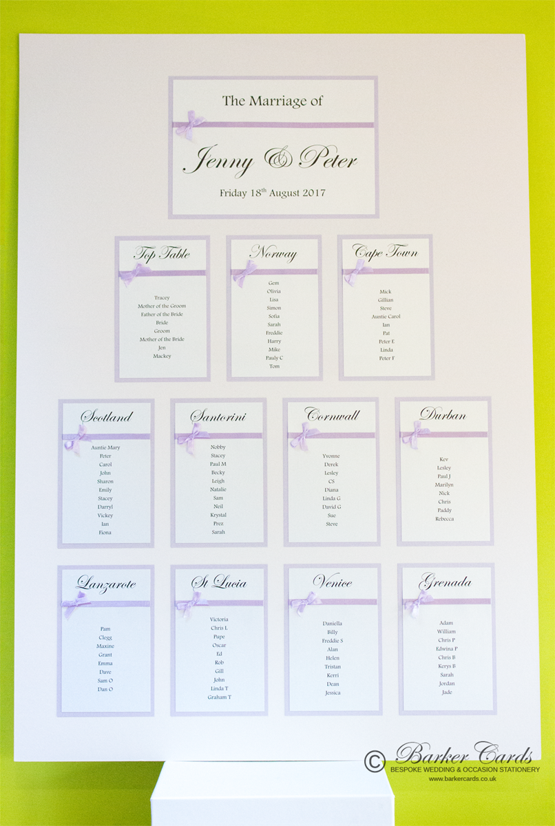 Bespoke wedding table plan in lilac and white with small bows
